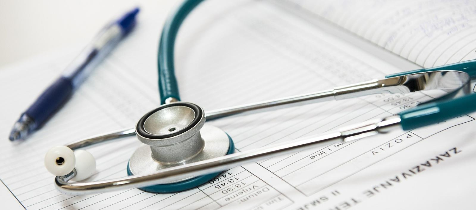 Stethoscope resting on a medical calendar